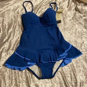 Brand new one piece bathing suit size 10 gottex is the brand